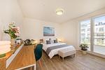 Schlafzimmer - Ferienwohnung Haff & Herz mit Fitness, Sauna, Freizeit- und Kinderspielbereich - Top-Hundeurlaub