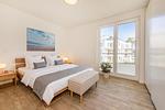 Schlafzimmer - Ferienwohnung Haff & Herz mit Fitness, Sauna, Freizeit- und Kinderspielbereich - Top-Hundeurlaub