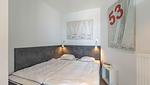 Schlafzimmer mit Doppelbett - Wohnung 24 - Wasserblick - Top-Hundeurlaub