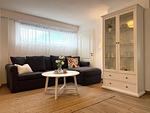 Wohnzimmer - Kapitänshaus FeWo 2 - Top-Hundeurlaub