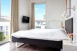 3. Schlafzimmer mit TV - Wohnung 05 - Top-Hundeurlaub