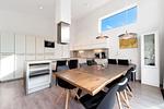 Wohnzimmer mit Blick zur Küche - Penthouse 05 - Top-Hundeurlaub