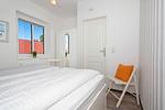 Schlafzimmer - Ferienhaus Waldhaus 6 mit Kamin, Sauna und Terrasse - Top-Hundeurlaub