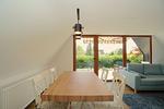 Wohnzimmer - Modernes Nurdachhaus in ruhiger Feriensiedlung direkt am Wittensee mit Seeblick - Top-Hundeurlaub
