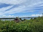 Modernes Nurdachhaus in ruhiger Feriensiedlung direkt am Wittensee mit Seeblick - Top-Hundeurlaub