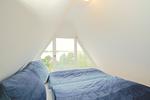 Schlafzimmer - Modernes Nurdachhaus in ruhiger Feriensiedlung direkt am Wittensee mit Seeblick - Top-Hundeurlaub