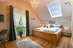 Schlafzimmer - Ferienwohnung Leuchtturm Suite - Top-Hundeurlaub