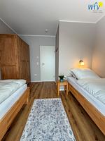 Schlafzimmer - Ferienwohnung Leuchtturm Suite - Top-Hundeurlaub