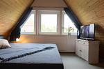 Schlafzimmer - Ferienhaus "Strandperle " Westertill 19 - Top-Hundeurlaub