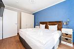 Schlafzimmer mit Doppelbett - Wohnung 03 - Top-Hundeurlaub