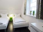 Schlafzimmer - Riedhaus am Siel - Top-Hundeurlaub