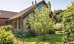 Außenansicht eines Holzhauses mit Garten - Alte Tischlerei 01 - Top-Hundeurlaub