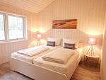 Strandhaus Nr. 10 - Traumurlaub am Großen Plöner See – Seeblick, Sauna & Whirlwanne, Kaminofen, für max. 8 Pers. - Top-Hundeurlaub