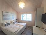 Strandhaus Nr. 10 - Traumurlaub am Großen Plöner See – Seeblick, Sauna & Whirlwanne, Kaminofen, für max. 8 Pers. - Top-Hundeurlaub