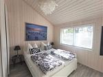 Strandhaus Nr. 10 - Traumurlaub am Großen Plöner See – Seeblick, Sauna & Whirlwanne, Kaminofen, für max. 8 Pers. - Top-Hundeurlaub