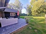Strandhaus Nr. 10 - Traumurlaub am Großen Plöner See – Seeblick, Sauna & Whirlwanne, Kaminofen, für max. 8 Pers. - Top-Hundeurlaub