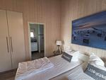 Strandhaus Nr. 10 - Traumurlaub am Großen Plöner See – Seeblick, Sauna & Whirlwanne, Kaminofen, für max. 8 Pers. - Top-Hundeurlaub