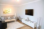Wohnzimmer - Apartments Meerzeit  B - Top-Hundeurlaub