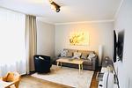 Wohnzimmer - Apartments Meerzeit  B - Top-Hundeurlaub