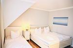 Schlafzimmer - Apartments Meerzeit A - Top-Hundeurlaub