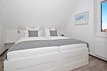 Schlafzimmer - Ferienhaus Waldhaus 6 mit Kamin, Sauna und Terrasse - Top-Hundeurlaub
