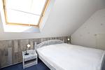 drittes oberes Schlafzimmer mit Doppelbett - Wohnung 03-7 - Top-Hundeurlaub