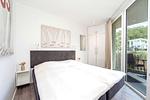 Schlafzimmer mit Doppelbett - Wohnung 01 - Top-Hundeurlaub