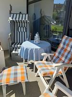 Entspannen Sie auf dieser stilvollen Terrasse mit Blick ins Grüne. - Berliner Hof App. 108 - Top-Hundeurlaub