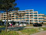 Außenansicht eines mehrstöckigen Gebäudes - Nautica App A6, Strandallee 65 Haffkrug - Top-Hundeurlaub
