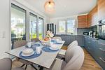 Küche / Küchenzeile - Ferienwohnung Haffmuschel mit Terrasse, Sauna- & Freizeitbereich - Top-Hundeurlaub