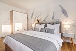 Schlafzimmer - Ferienwohnung Haffmuschel mit Terrasse, Sauna- & Freizeitbereich - Top-Hundeurlaub