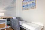 Schlafzimmer - Ferienwohnung Haffmuschel mit Terrasse, Sauna- & Freizeitbereich - Top-Hundeurlaub