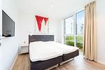 erstes Schlafzimmer mit Doppelbett - Wohnung 01 - Top-Hundeurlaub