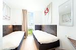 zweites Schlafzimmer mit Einzelbetten - Wohnung 01 - Top-Hundeurlaub