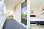 Terrasse mit Eingang zum dritten Schlafzimmer - Wohnung 01 - Top-Hundeurlaub