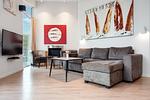 Wohnzimmer mit Sofa - Wohnung 05 - Top-Hundeurlaub