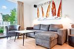 Wohnzimmer Sofa und Sessel - Wohnung 03 - Top-Hundeurlaub