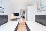 zweites Schlafzimmer mit TV - Wohnung 03 - Top-Hundeurlaub