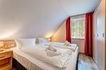 Schlafzimmer - Dünenhaus Ückeritz UnserUsedomDe FeWo ca.80qm mit privater Sauna und Kamin, direkt am Strand. 3/3 - Top-Hundeurlaub