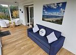 Wintergarten mit neue Schlafcouch - Lütt Haffhus - Haffkrug - Top-Hundeurlaub