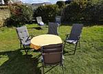 Garten mit Tisch und Stühlen - Lütt Haffhus - Haffkrug - Top-Hundeurlaub